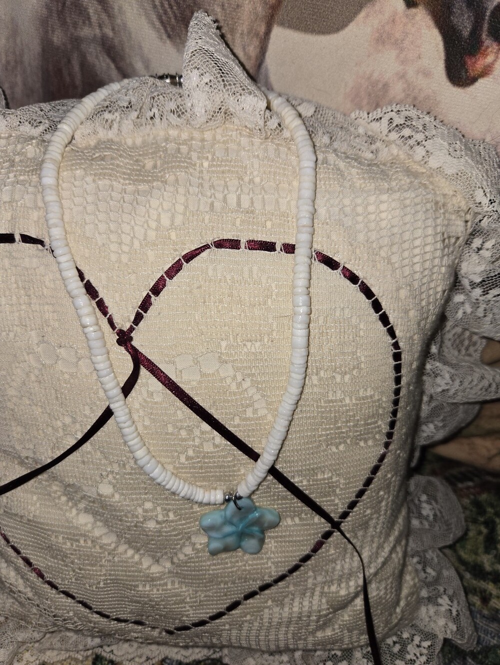 White Beaded Necklace with Blue Flower Pendant
